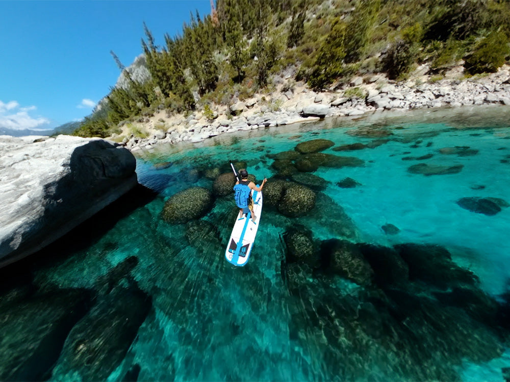 Paddleboarding on the clear waters of lake tahoe in california