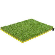 Artificial grass mat with a yellow border on a white background