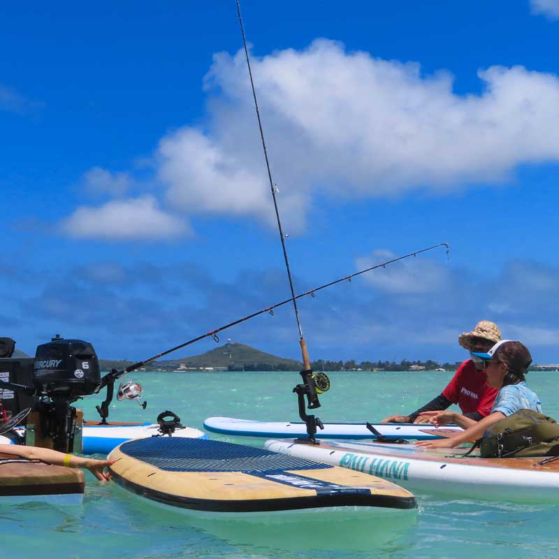 "Pau Hana Surf Supply all around and   touring boards fishing and relaxing with friends Kaneohe Bay Oahu Ko'olau Mountains Hawaii"