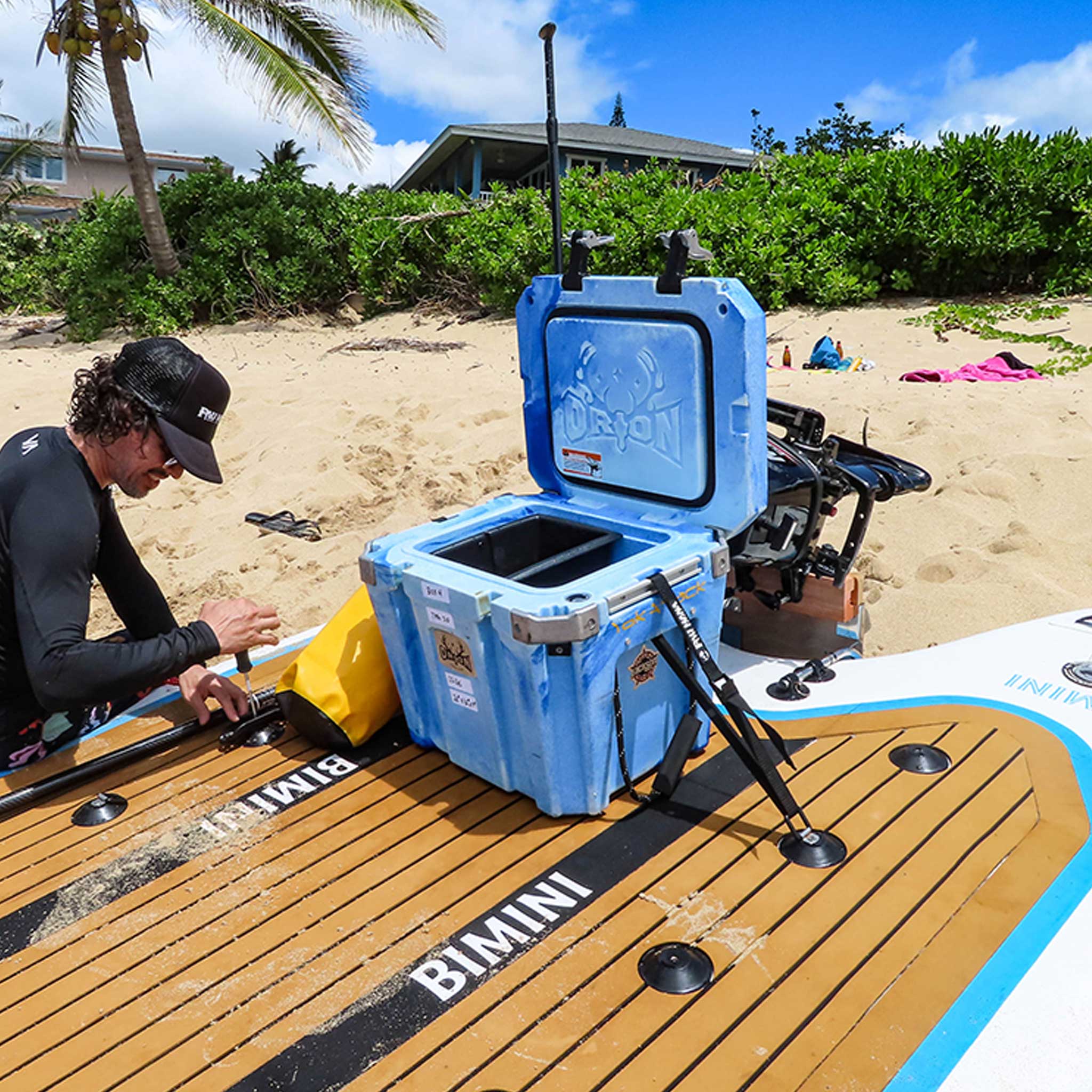 Preparing the Pau Hana Surf Supply Bimini Skiff giant inflatable paddleboard for a day of adventures in Oahu