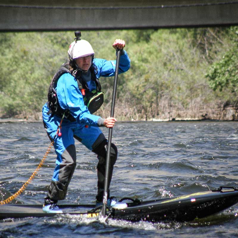 "Pau Hana Surf Supply Diablo whitewater SUP with full whitewater safety gear with a quick release leash on Kern River Festival SUP slalom race run"