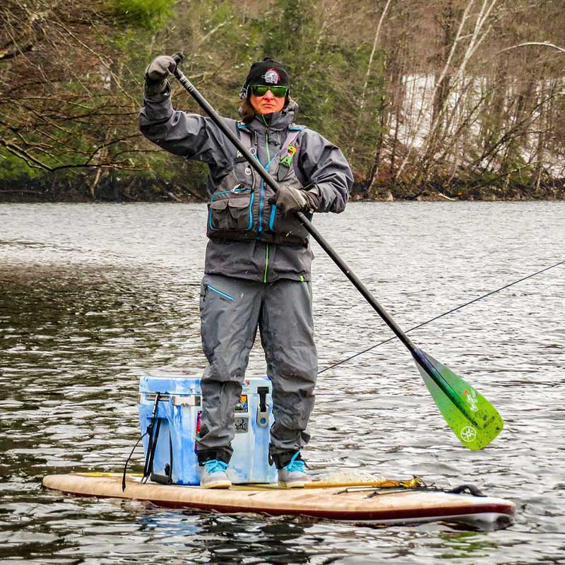 "Pau Hana Surf Supply Navio VFT paddling in cold weather gear wearing fishing PFD on Vermont Reservoir early spring paddling and fly fishing for trout"