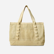 Beige tote bag on a light gray background
