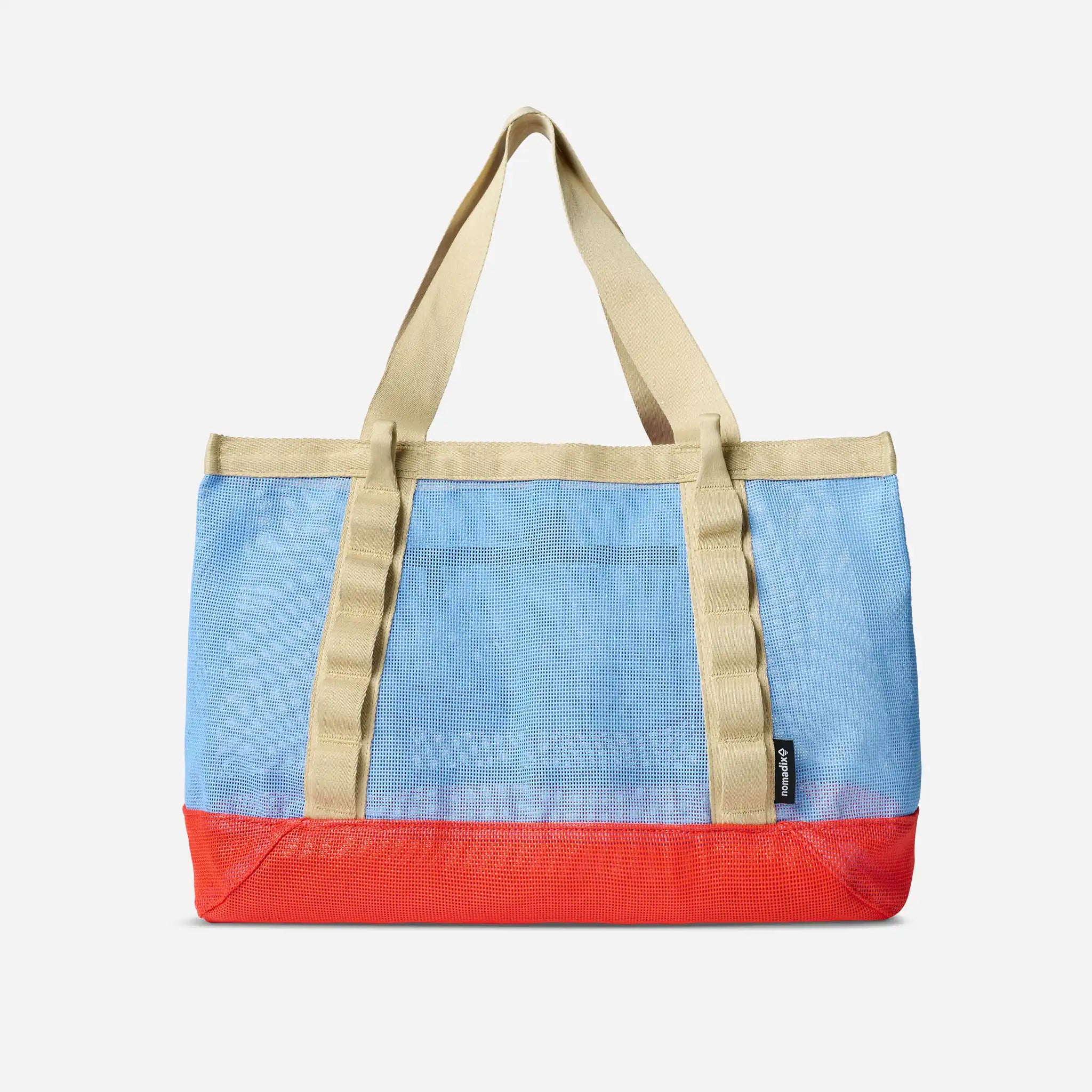 Tote bag with blue top half and red bottom half on a white background