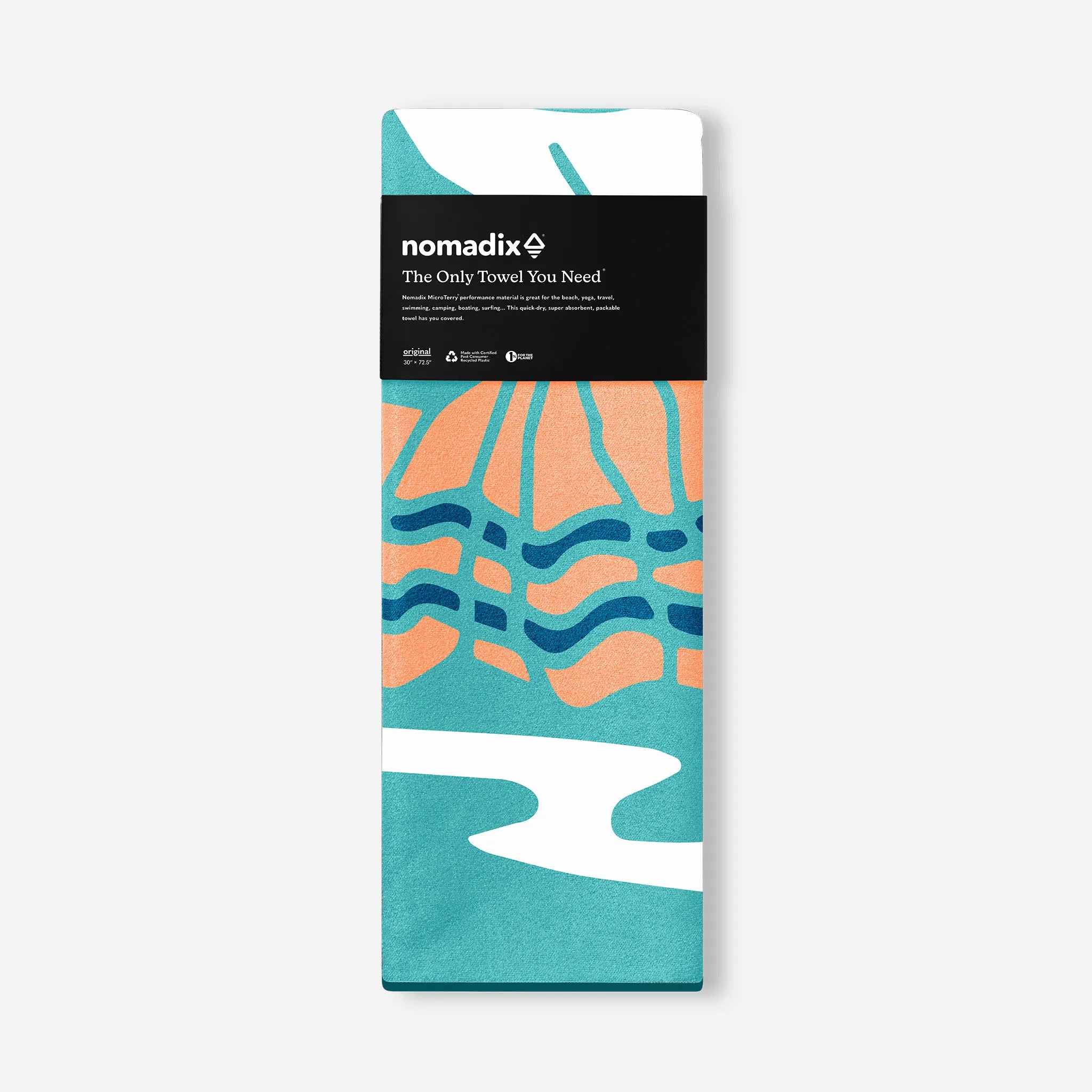 Folded towel with colorful design and Nomadix branding on a white background
