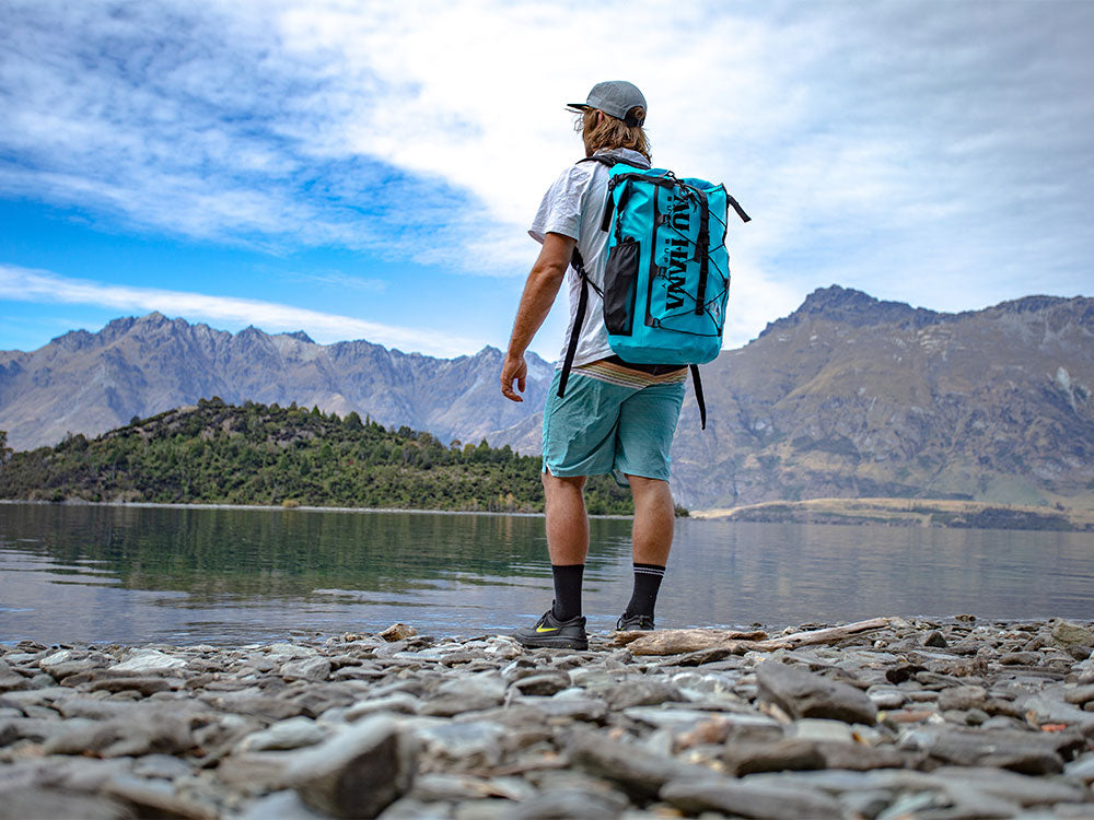 "Pau Hana Surf Supply Solo Sup Backcountry travel SUP in hiking backpack for remote lake access"